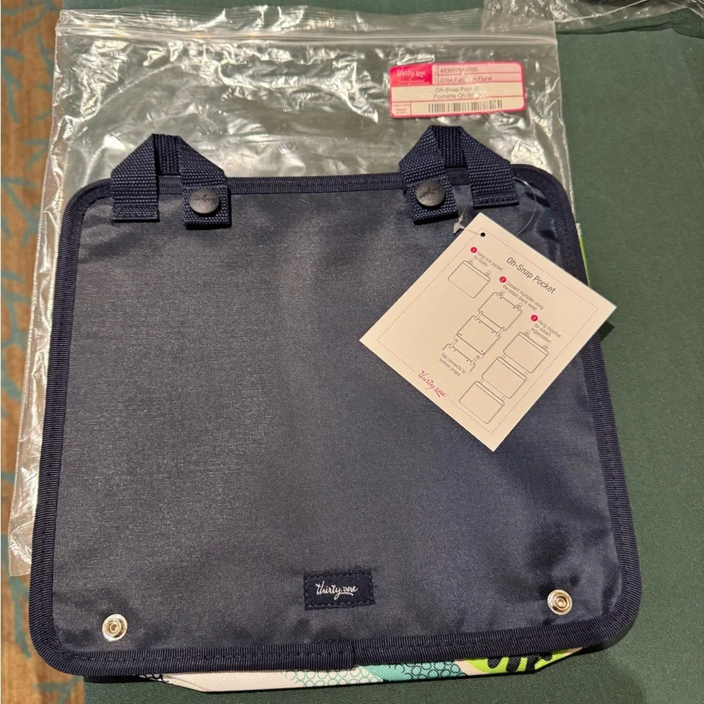 Thirty-One Floral oh snap pocket. NWT. Navy and green in color.
